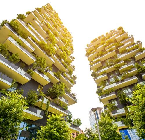 Milan, Italy - June 05, 2016: Pair of residential towers with trees called Bosco Verticale in the Porta Nuova district designed by Boeri Studio